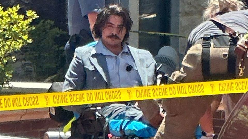 Livestreamer known for posting racist content is in custody after shooting outside courthouse