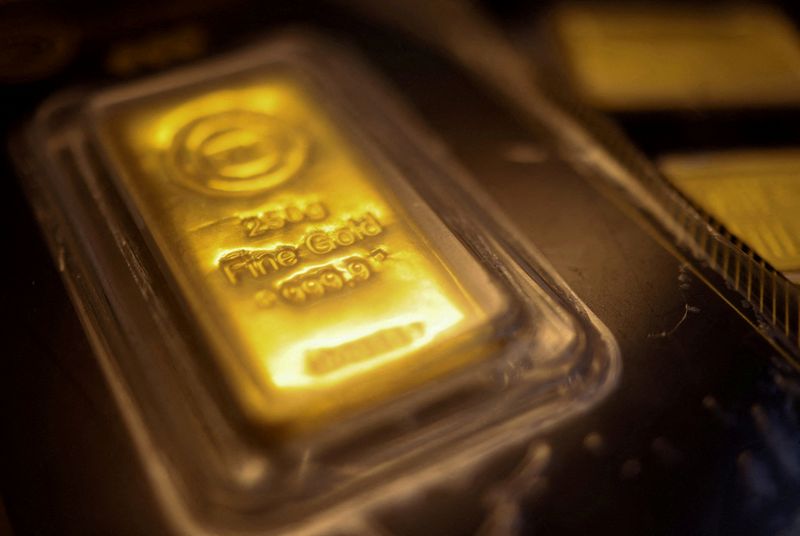 Gold slips as US-Iran tensions lift oil, stoke inflation fears