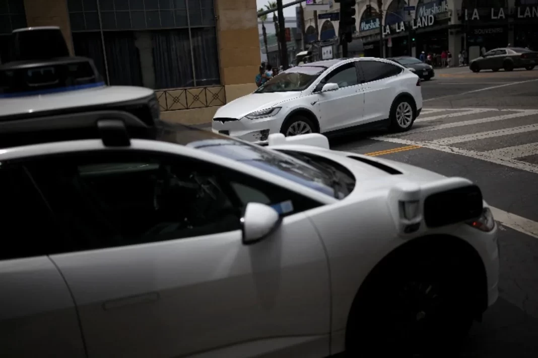 Tesla’s Musk expects widespread use in US of cars without human monitors this year