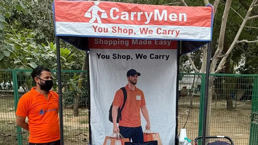 Now you can hire people to carry your shopping bags in Delhi
