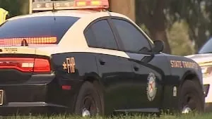 Two Florida Highway Patrol troopers surrender themselves to Osceola County Jail