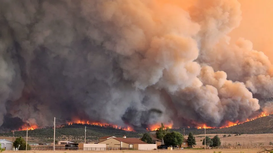 Fast-moving wildfires scorch thousands of acres across the West, and there’s more danger ahead