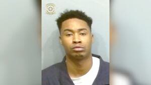 Man charged with murder after man found dead on Atlanta sidewalk
