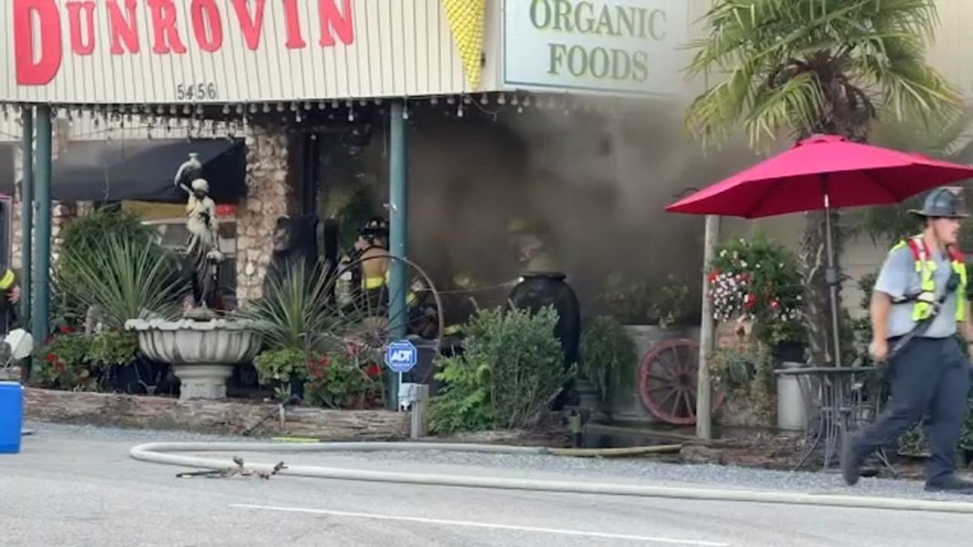 Investigation underway after four-alarm fire at Moore County store