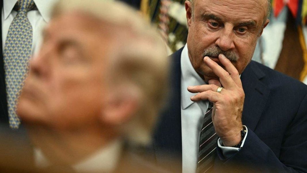 Dr. Phil McGraw’s former publicist alleges humiliating antigay insults and discrimination. He’s suing